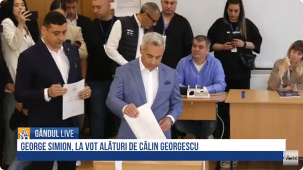 Georgescu, Simion voting together